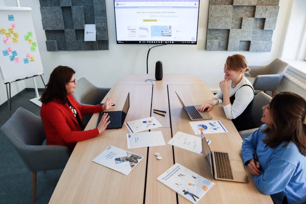 Professionals discussing data privacy strategies in a modern office meeting focused on healthcare and security policies
